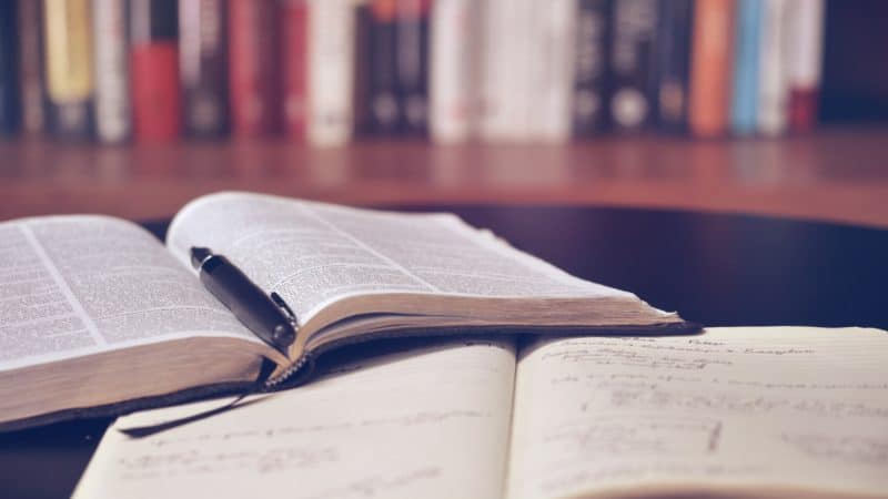 Open Bible with notes about study