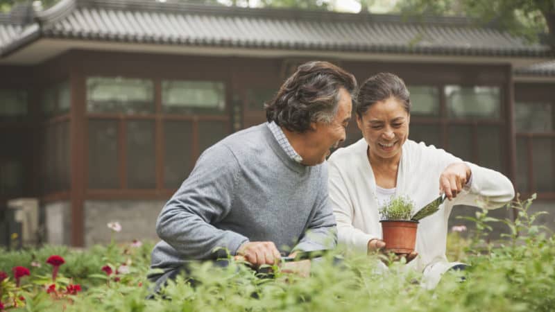 couple gardening together and enjoying a healthy lifestyle