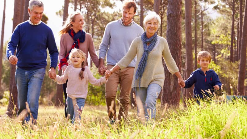 Multigenerational family enjoying a walk outdoors on a Sabbath afternoon