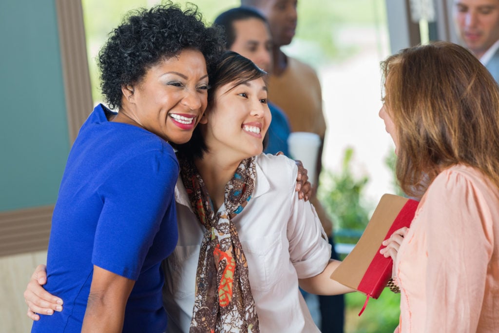 Group of friends greeting at Bible study