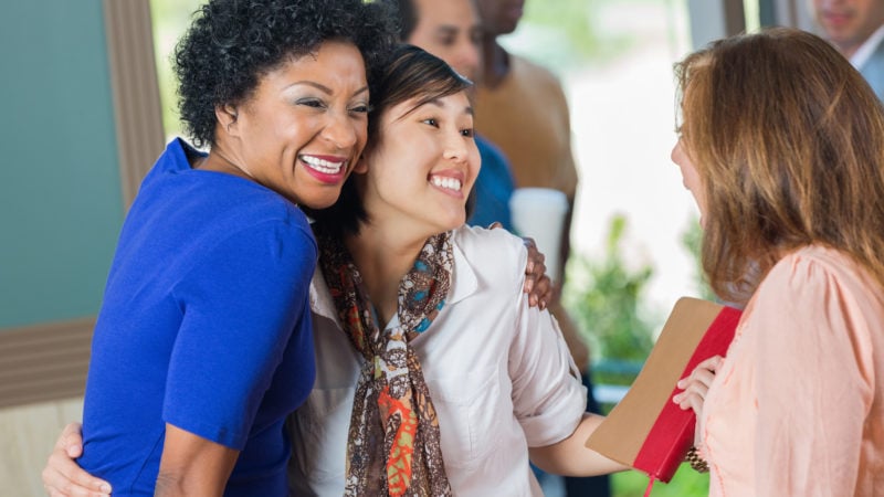 Group of seventh day adventist friends greeting at Bible study