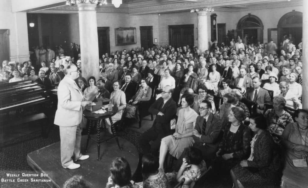 Famous Adventist John Harvey Kellogg answering questions at Battle Creek Sanitarium 