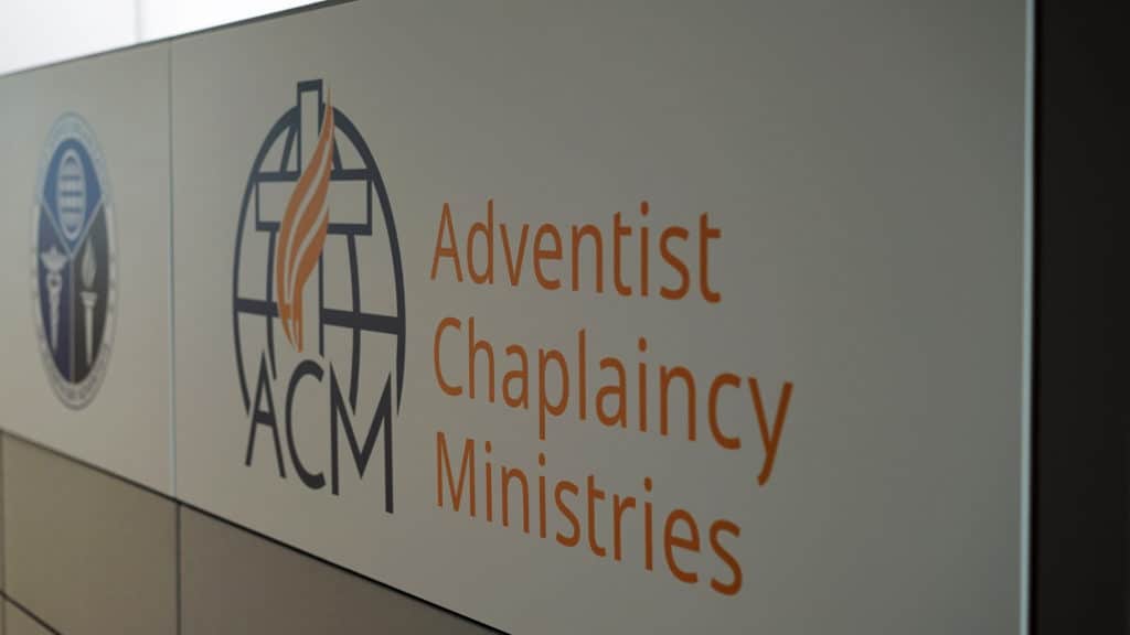 Adventist Chaplaincy Ministries Sign with logo for Adventist Chaplaincy Ministries