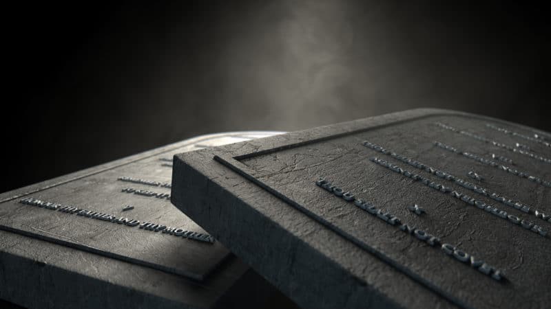 The Ten Commandments The Ten Commandments written on two stone tablets lying on a table
