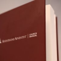 red cover sda church manual