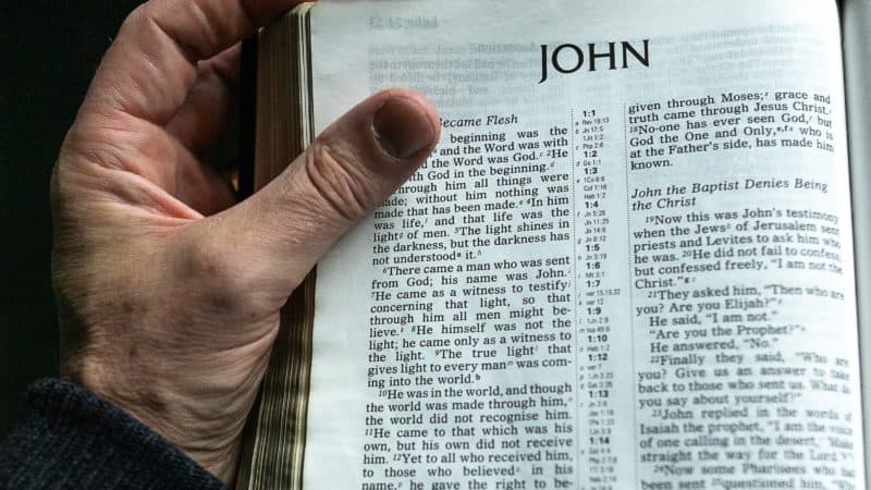 Bible open to the book of John Bible open to book of John