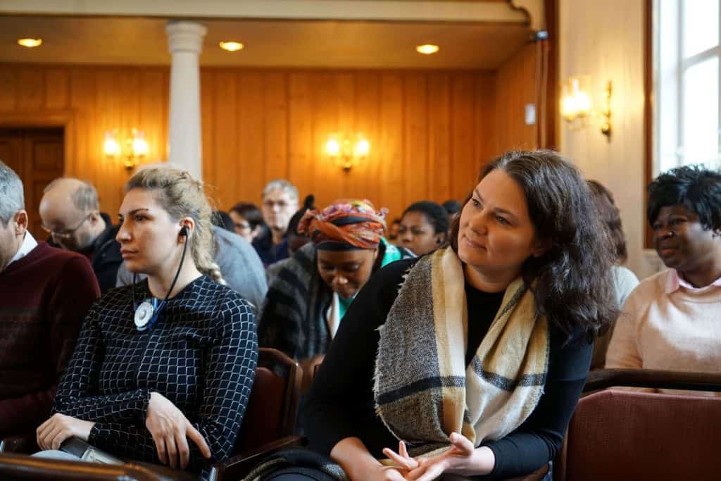 Diverse congregation listening to the sermon at church on Sabbath