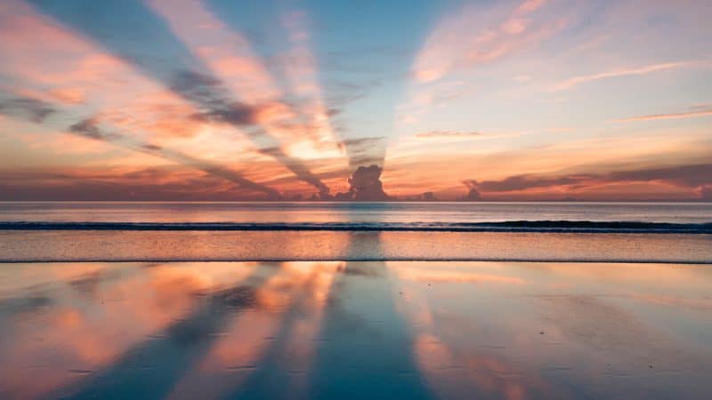 Beautiful sunset over the water at the beach