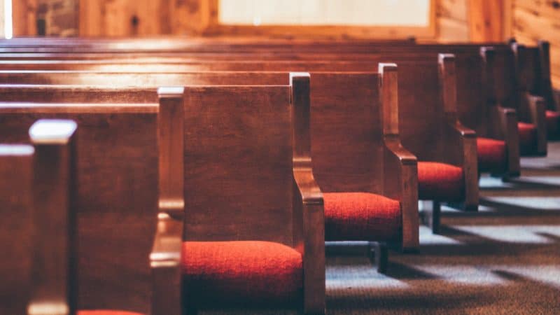 Empty church pews.