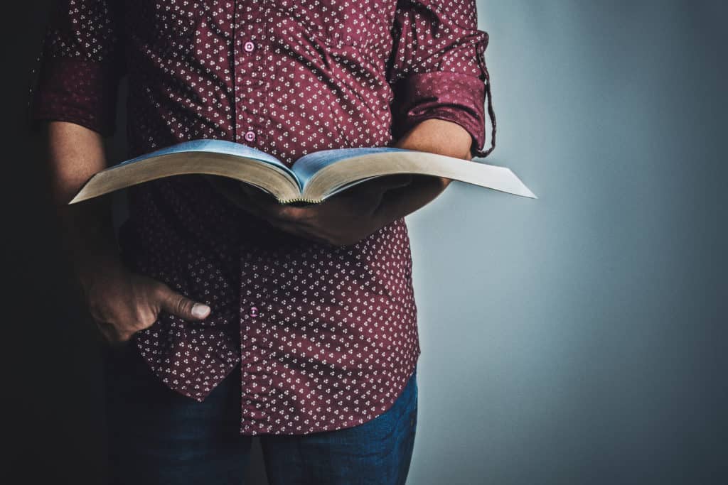 A man reading the Bible.