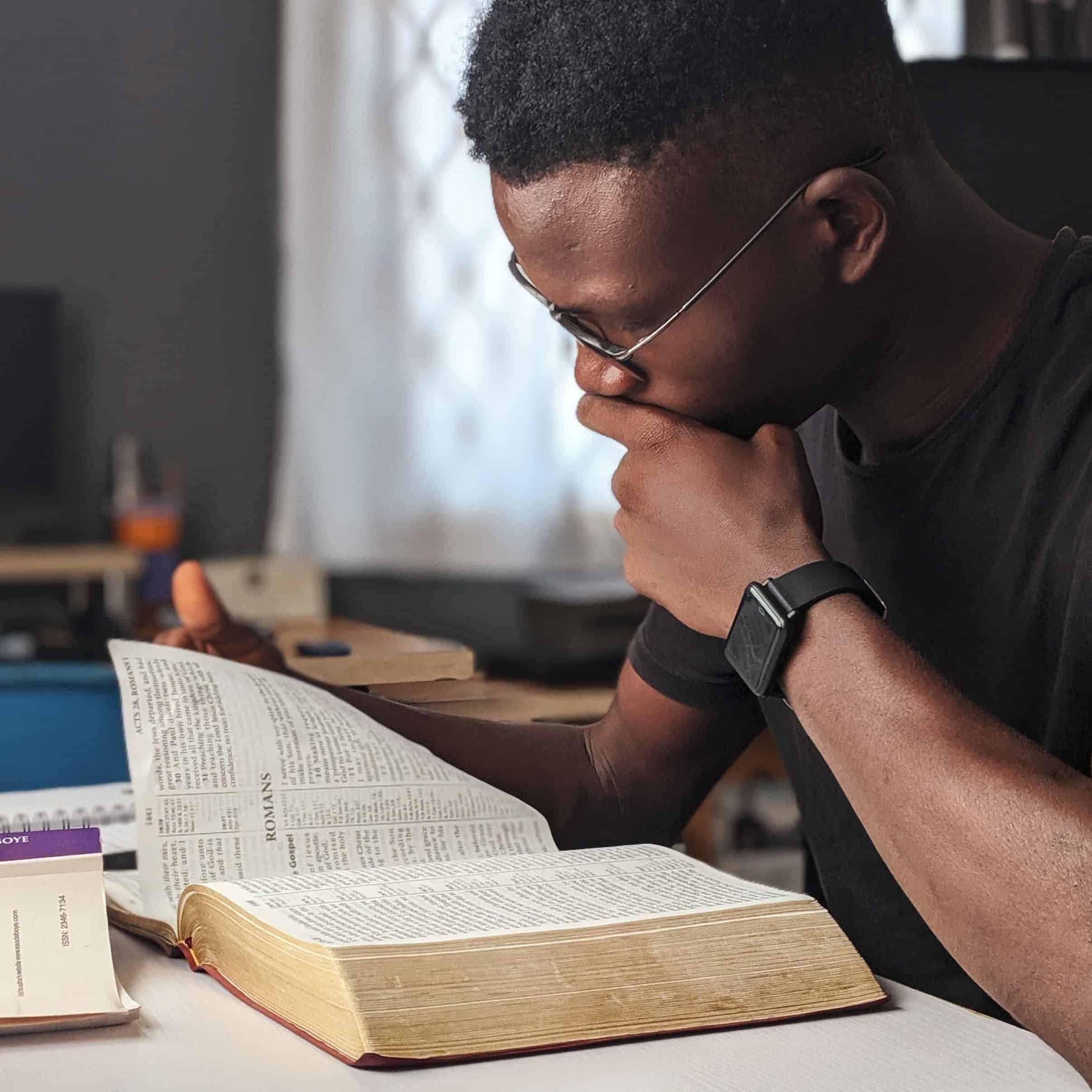 Man studying the Bible.