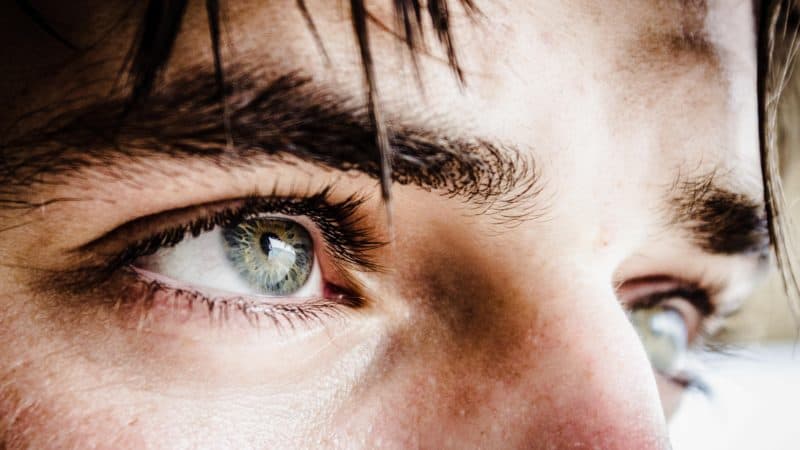 Close-up of a man's eyes as the Scripture says that every eye will see Him coming on clouds of heaven