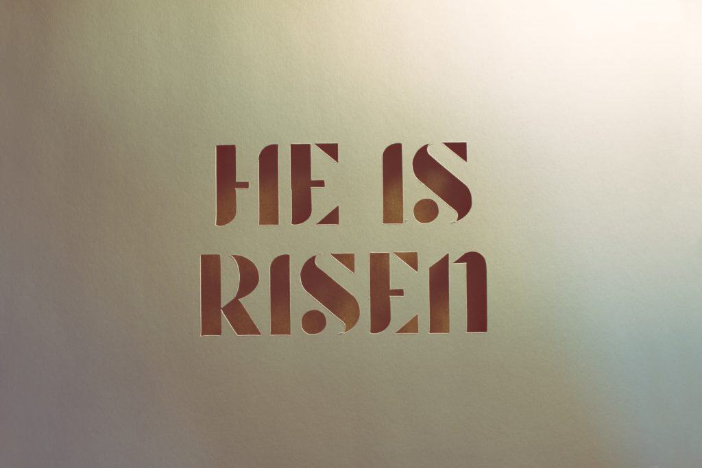 A sign that says 'He is Risen'