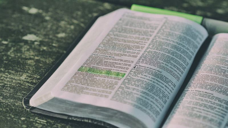 open bible on table to be used in your daily life