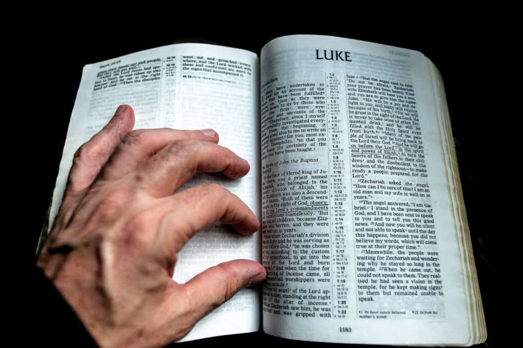 The Bible open to the book of Luke.