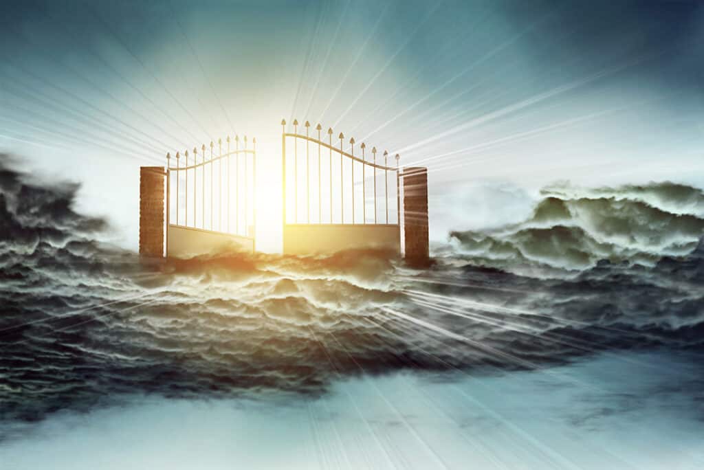 Heavenly gates opening with a bright light shining behind. 