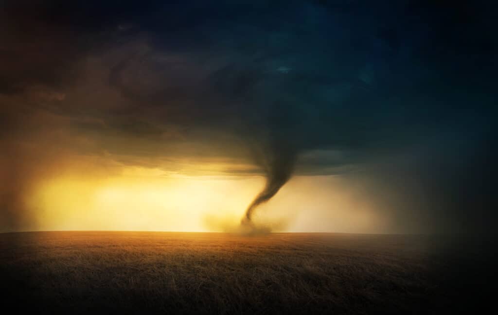 A tornado destroying a path across the Earth, as what is prophesied that more natural disasters will happen during the end.