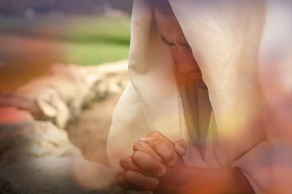 Jesus praying in the Garden of Gethsemane, asking for help from God.