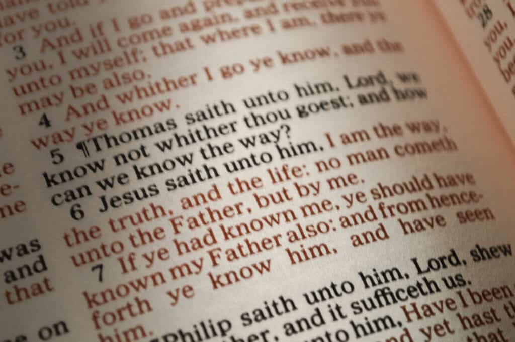 A close up of the Bible verse of Jesus describing His role in salvation and His relationship to the Father.